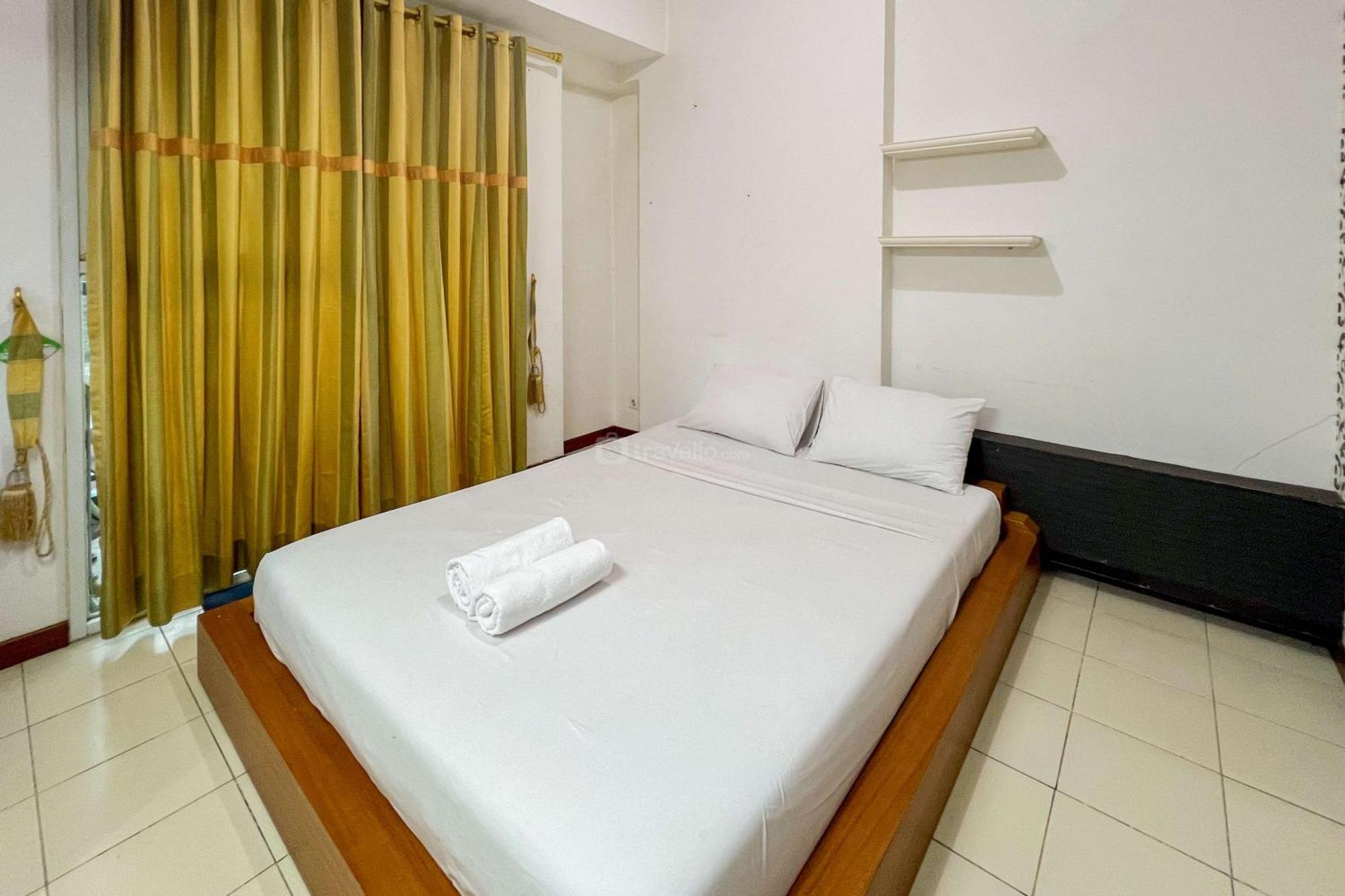 Apartemen Cozy 1br At Marbella Dago Pakar By Travelio